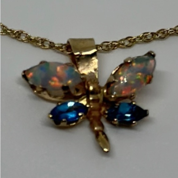 10k real solid gold necklace and real opal stores and blue topaz stone